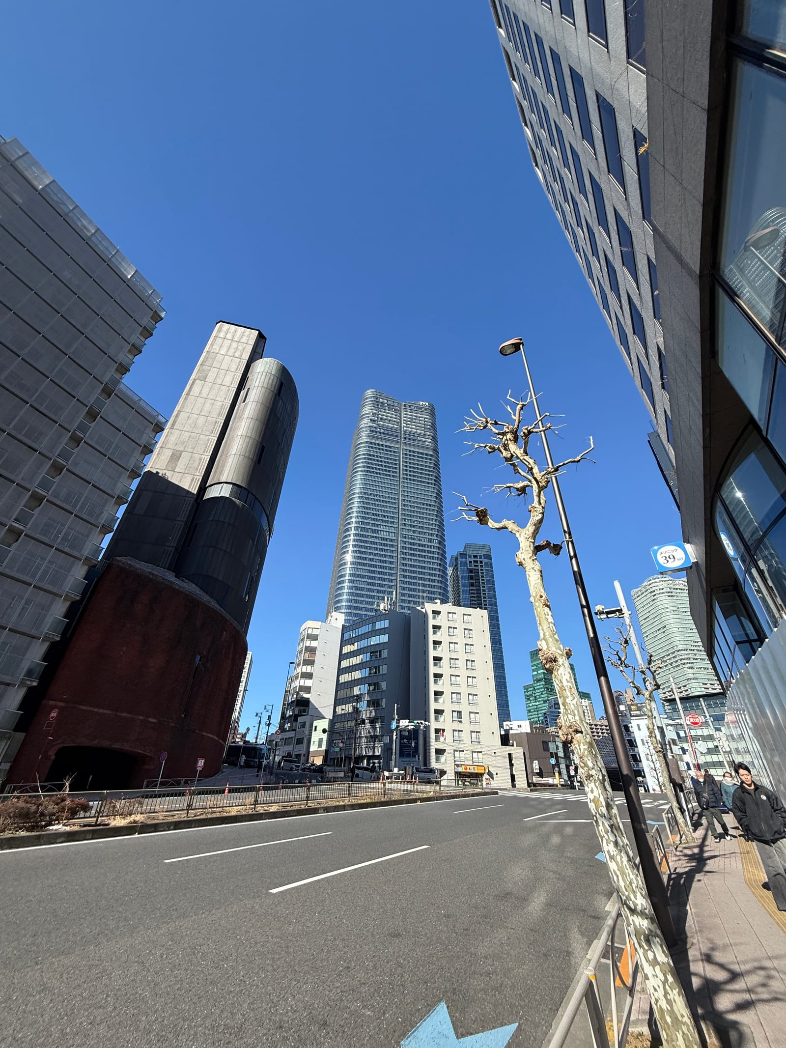 High-rises on the walk from Tokyo Tower toward Azabudai Hills.