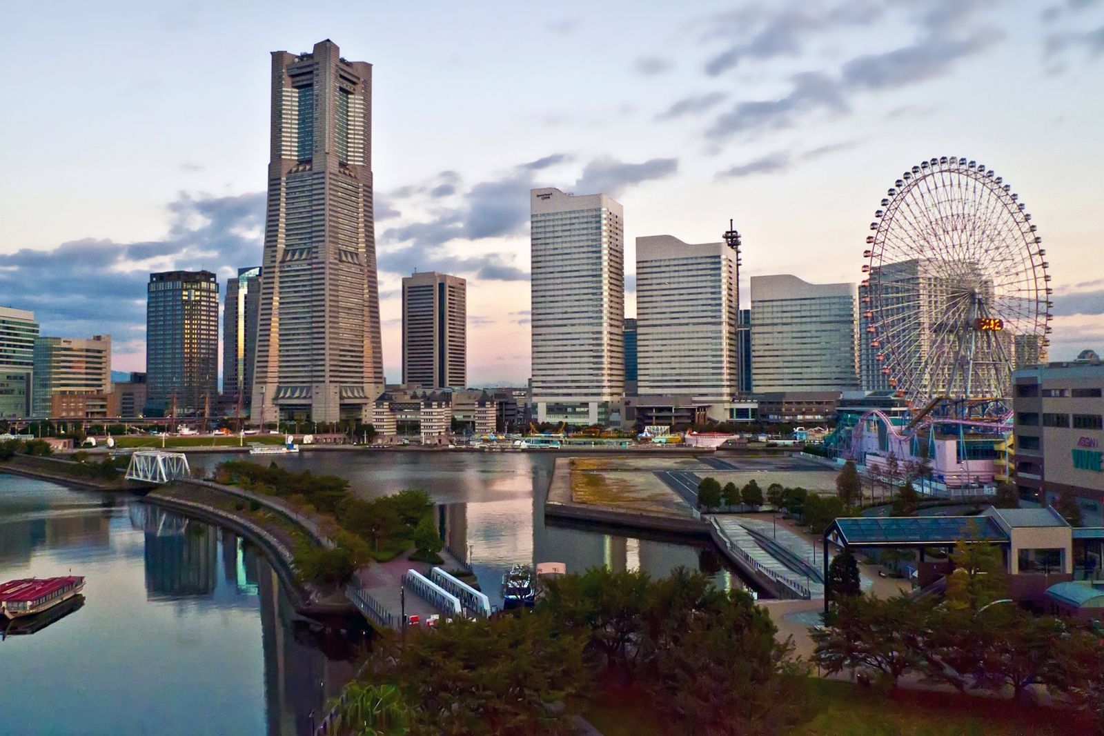 Minato Mirai, Yokohama, at dusk: Landmark Tower, the Cosmo Clock ferris wheel and the canal.