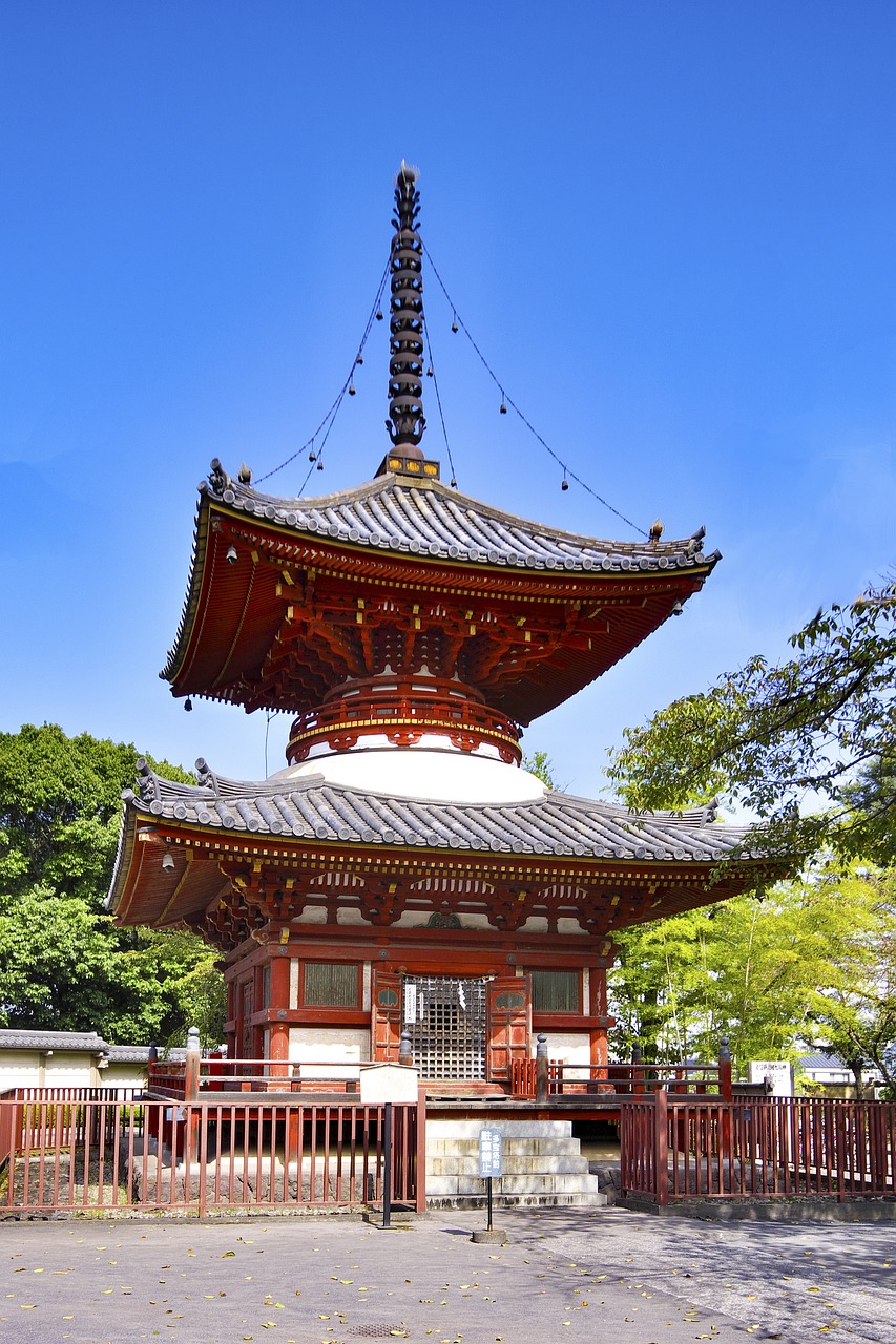 The red two-tiered tahoto pagoda at Kitain under a blue sky