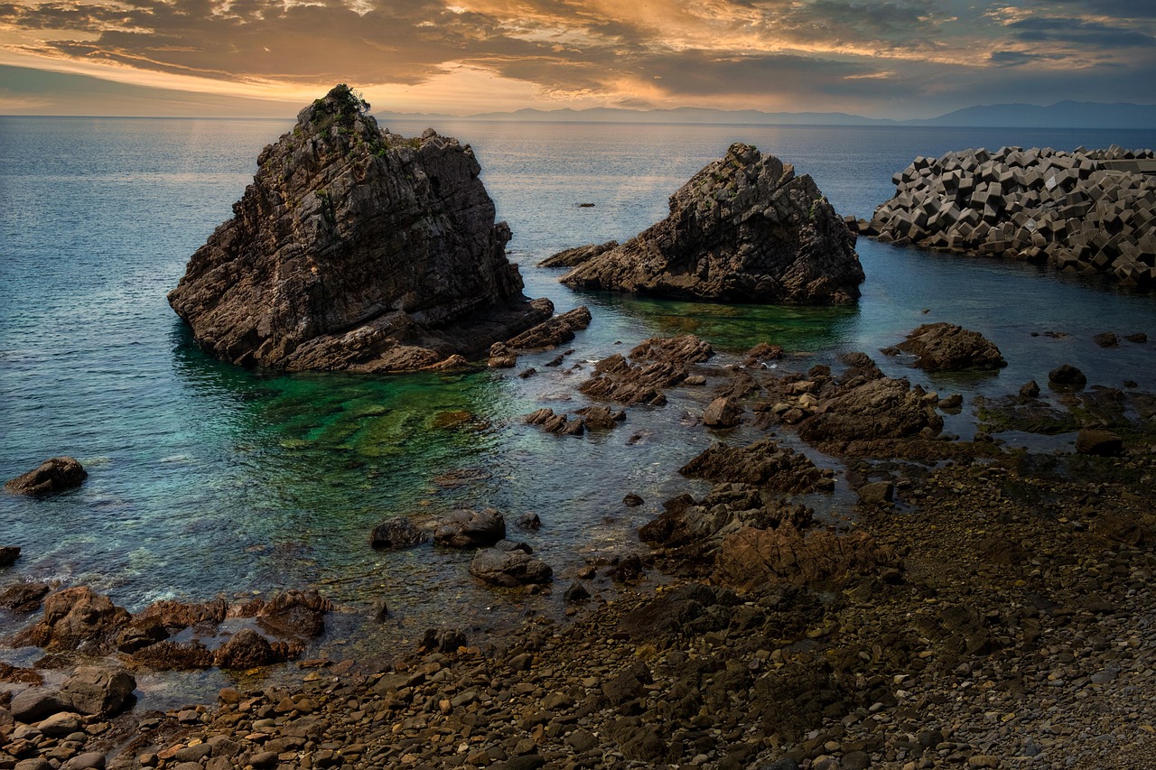 Two rock stacks in clear water off the Amakusa west coast at sunset