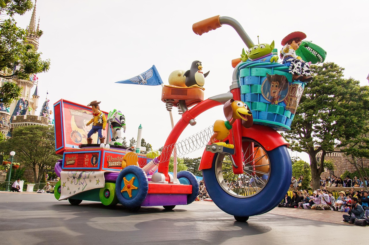 A Toy Story themed parade float at a Tokyo Disney park, a castle turret visible in the background.